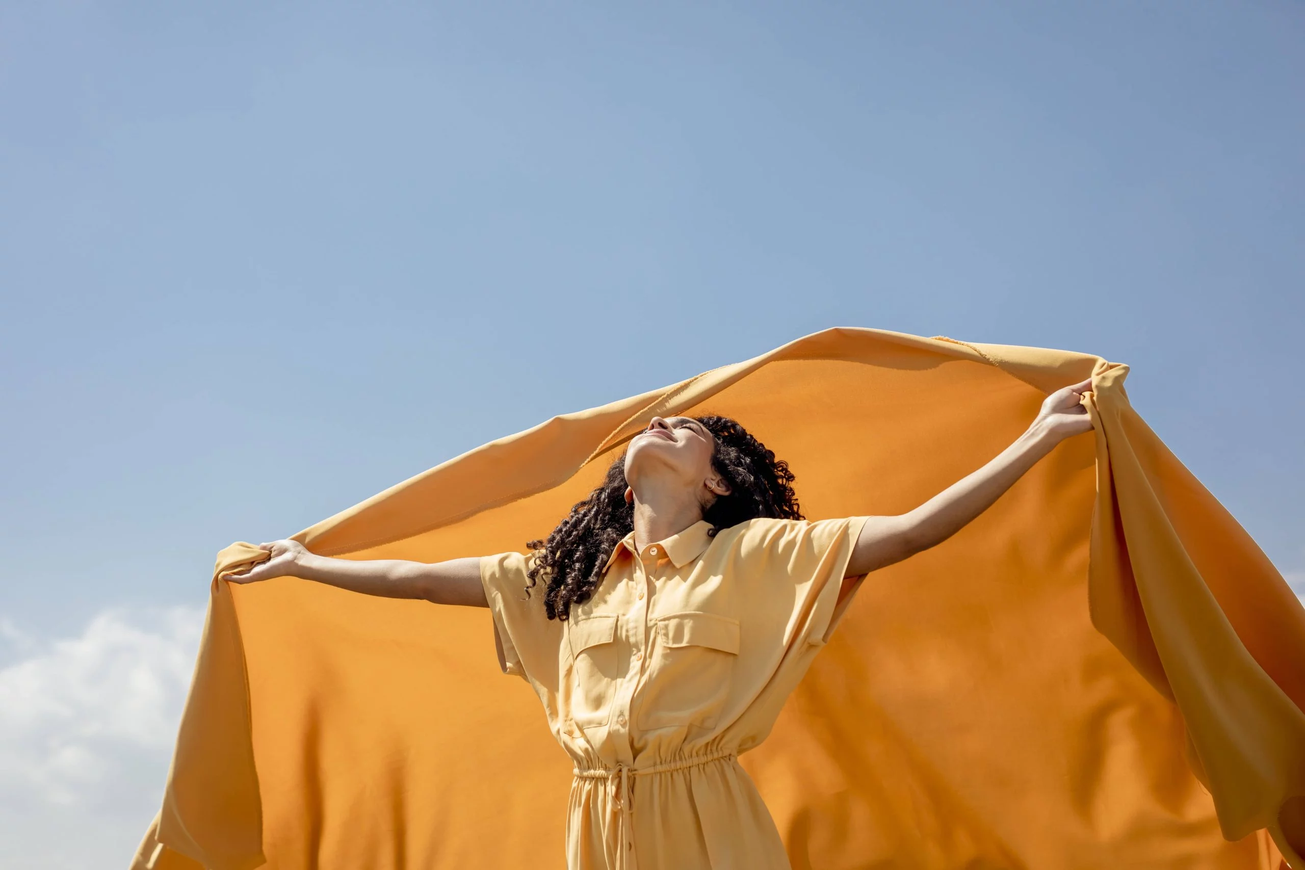 portrait-joyful-woman-with-yellow-cloth-nature (1)